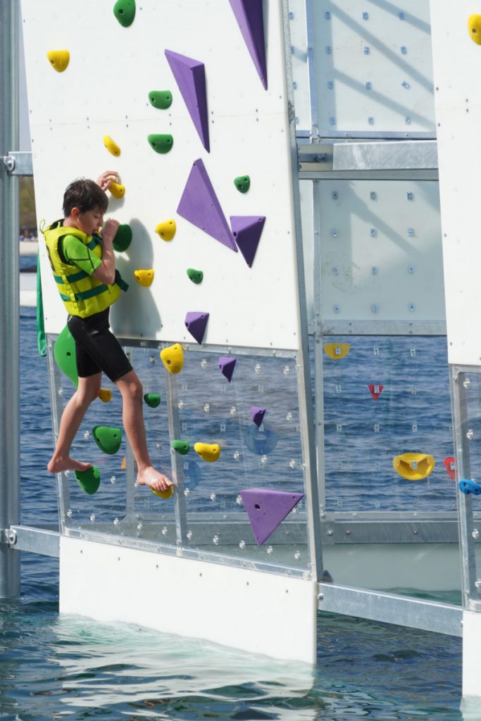 Child climbing a wall