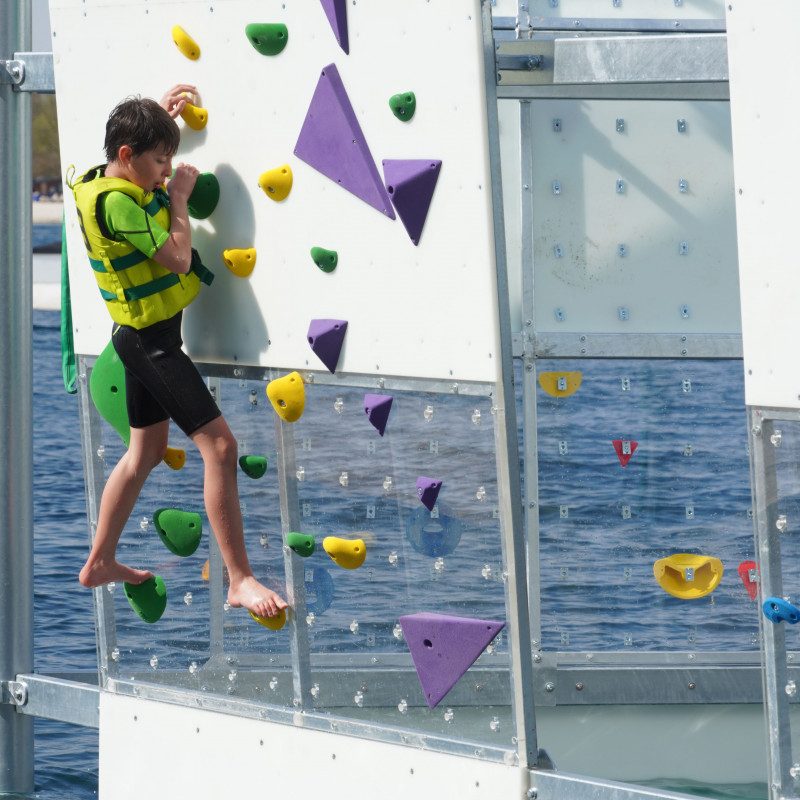 Child climbing a wall